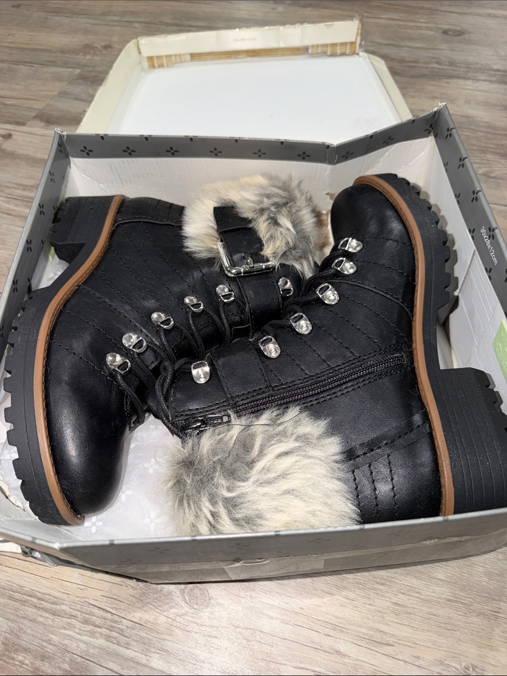 Sun + Stone Black Faux Fur Combat Boots with Lug Sole and Silver Hardware